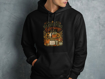 Black hoodie with "Harvesting Blessings" and Psalm 107:1.