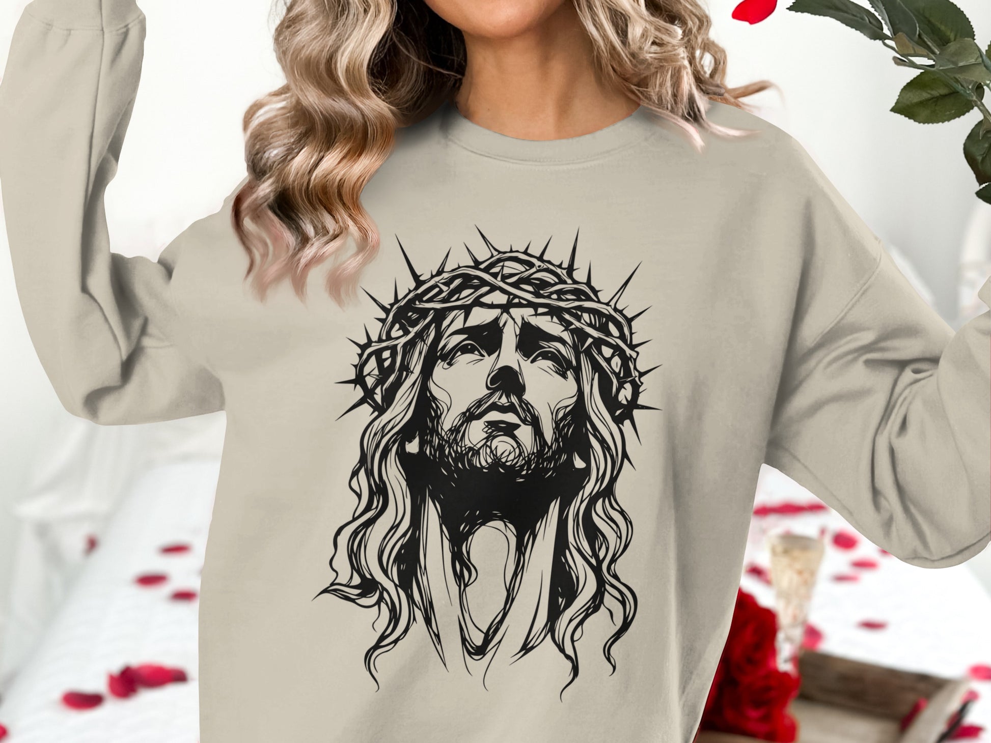 Sweatshirt with a black ink drawing of Jesus Christ wearing a crown of thorns.
