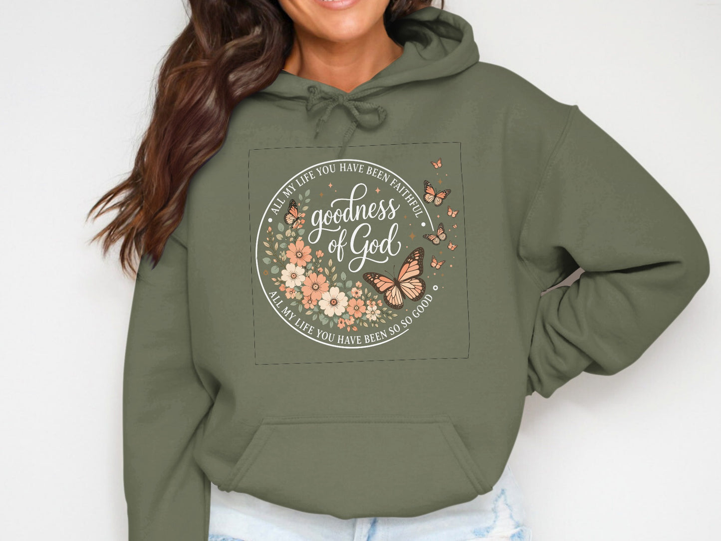 Green hoodie with circular floral and butterfly graphic and text.