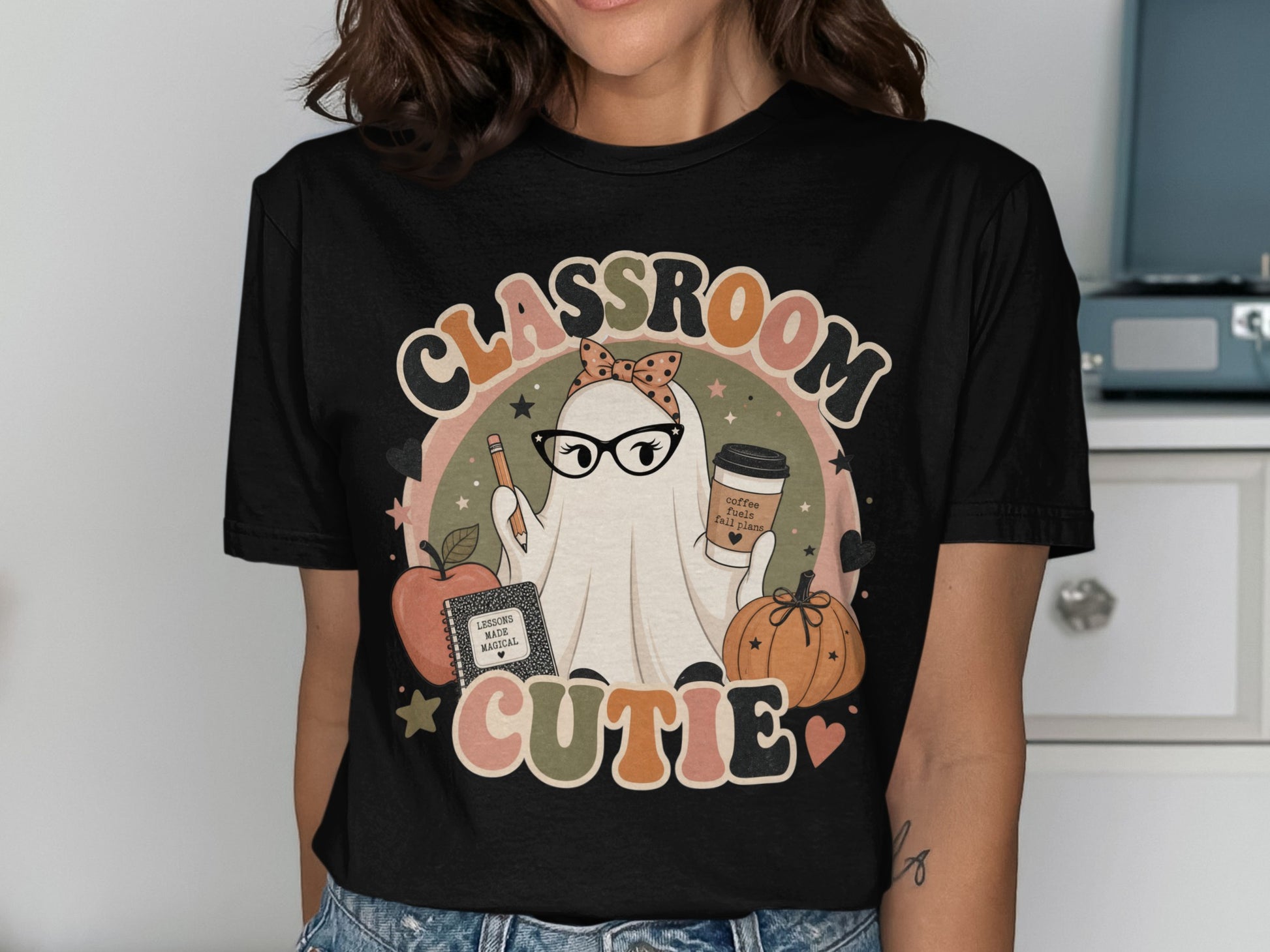 Classroom Cutie graphic on black t-shirt with ghost, apple, pumpkin, and coffee.