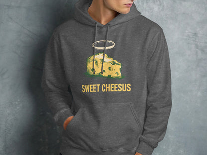 Dark grey hoodie with "Sweet Chesus" text and a haloed slice of Swiss cheese graphic.