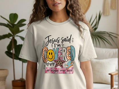 Cream t-shirt with Jesus said I'm Covered and no stress over here design.