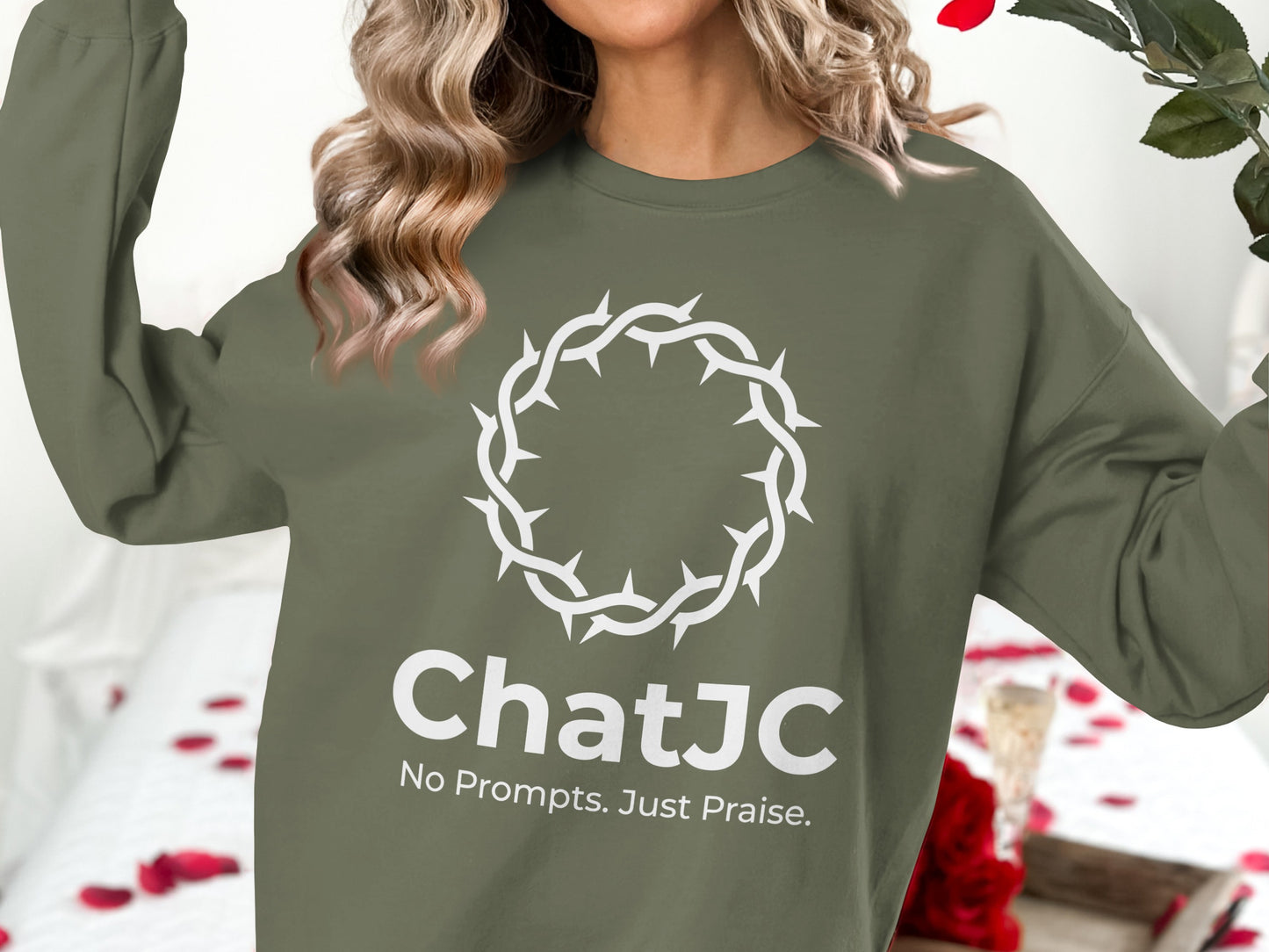 Olive green sweatshirt with "ChatJC" and "No Prompts. Just Praise." text and a crown of thorns graphic.