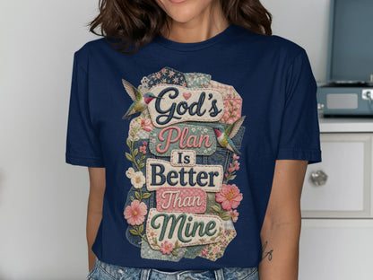 Navy t-shirt with "God's Plan is Better Than Mine" floral and hummingbird design.