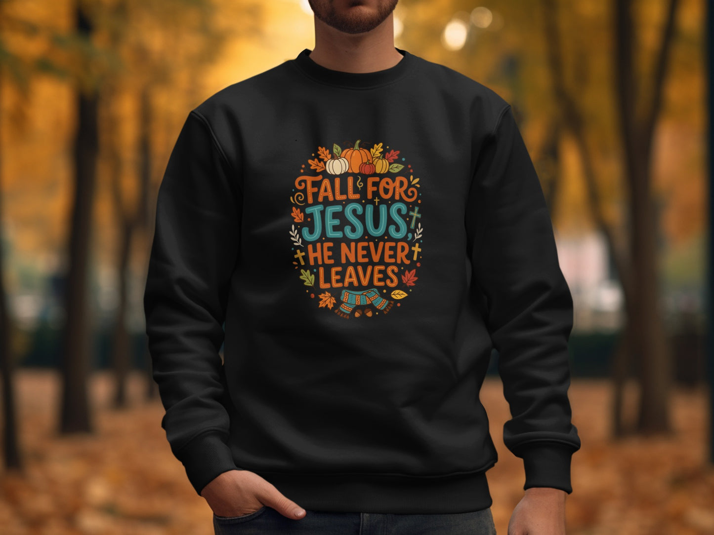Black sweatshirt with "Fall for Jesus, He Never Leaves" text and autumn graphics.