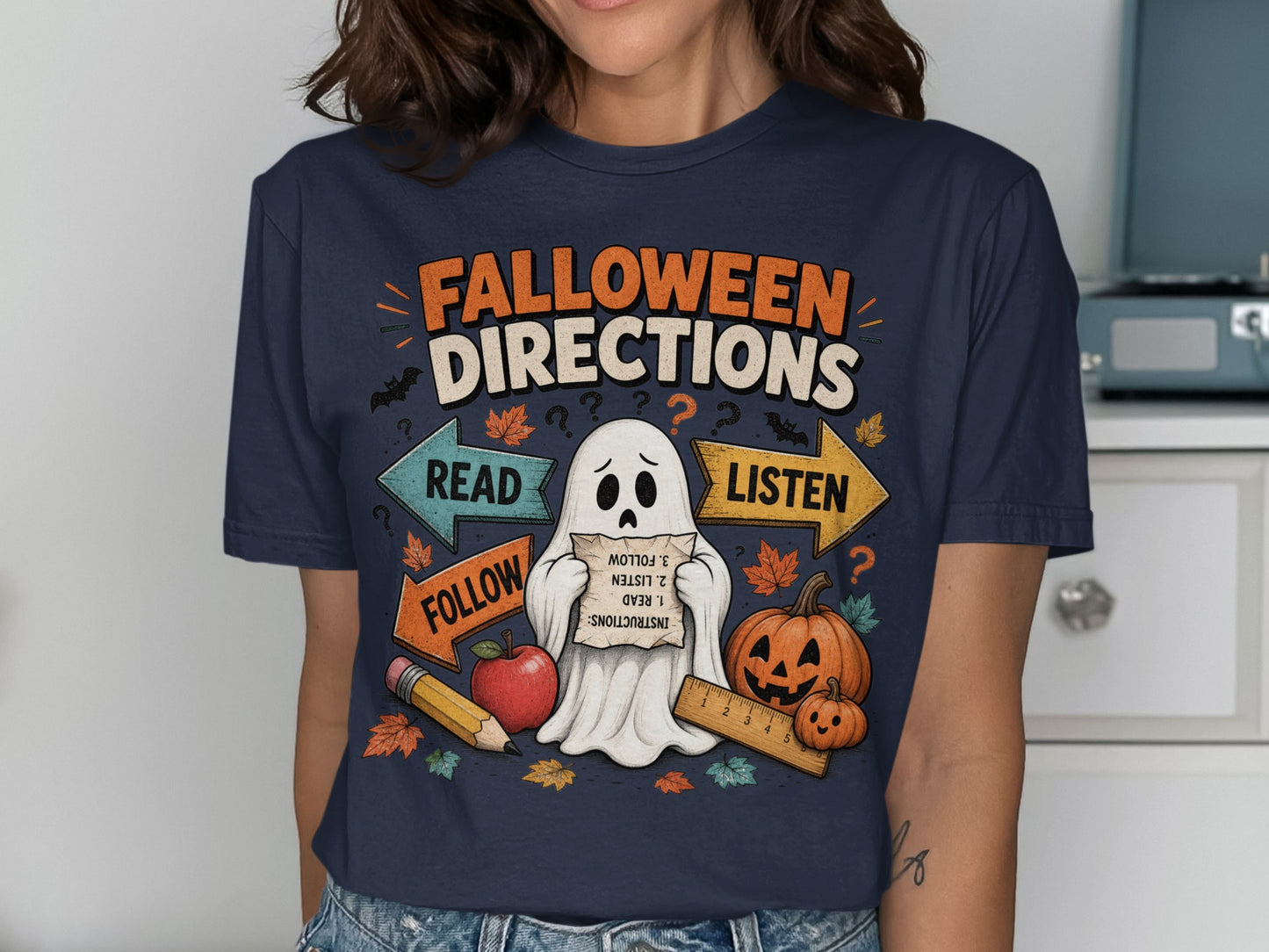 Falloween Directions shirt with ghost, pumpkins, and arrows for read, listen, follow.