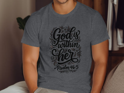 Dark grey t-shirt with "God is within her Psalm 46:5" floral text.