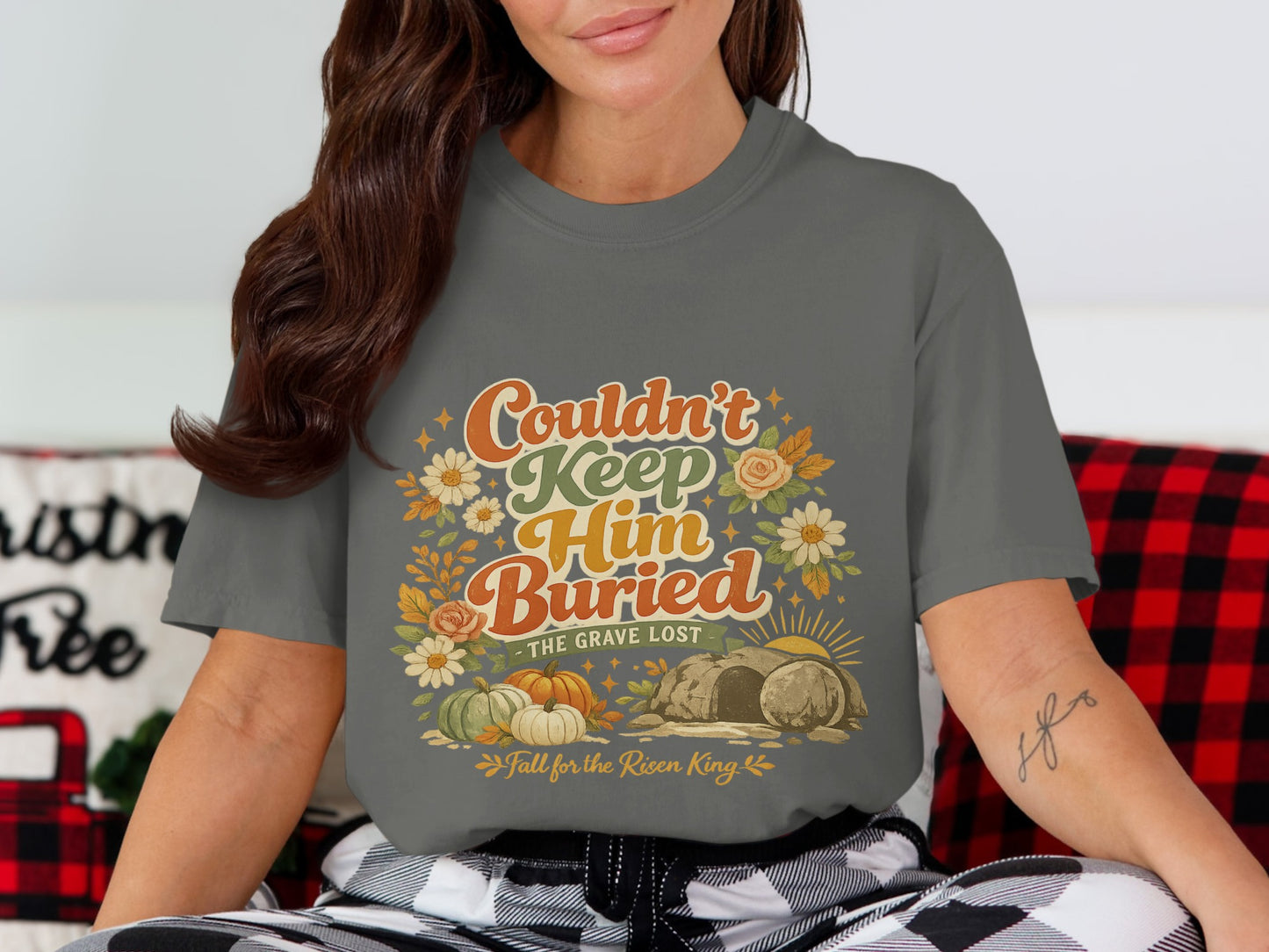 Gray t-shirt with "Couldn't Keep Him Buried, The Grave Lost" and "Fall for the Risen King" text.
