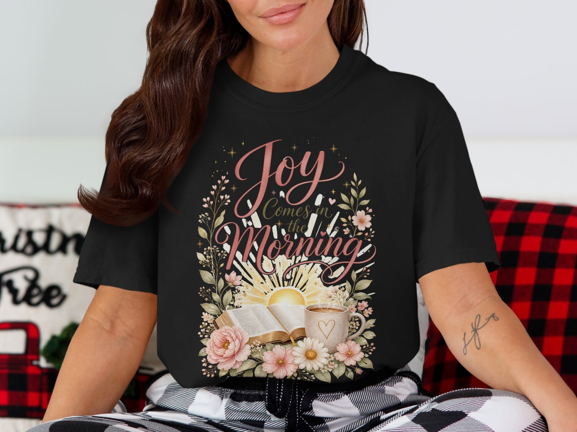 Black t-shirt with floral design and "Joy Comes in the Morning" text.