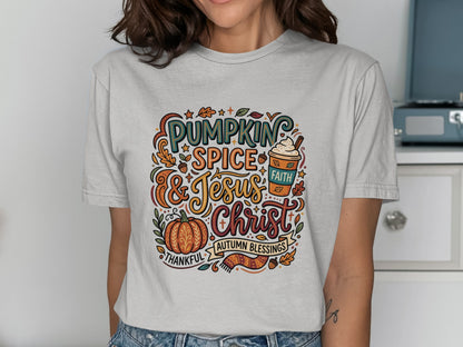 Graphic tee with "Pumpkin Spice & Jesus Christ, Autumn Blessings" text and fall motifs.