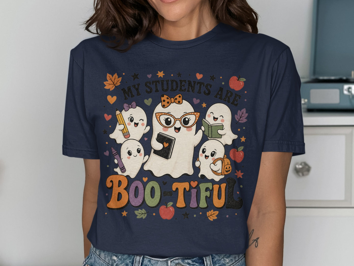 Cute ghosts with school supplies and the text "My Students Are Boo-tiful".