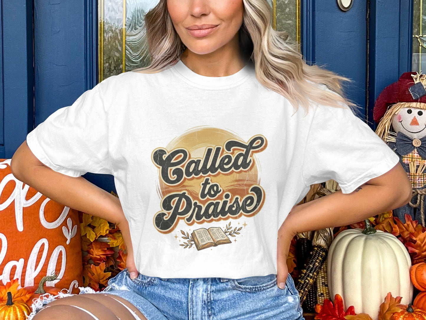 White t-shirt with "Called to Praise" text and open book graphic.