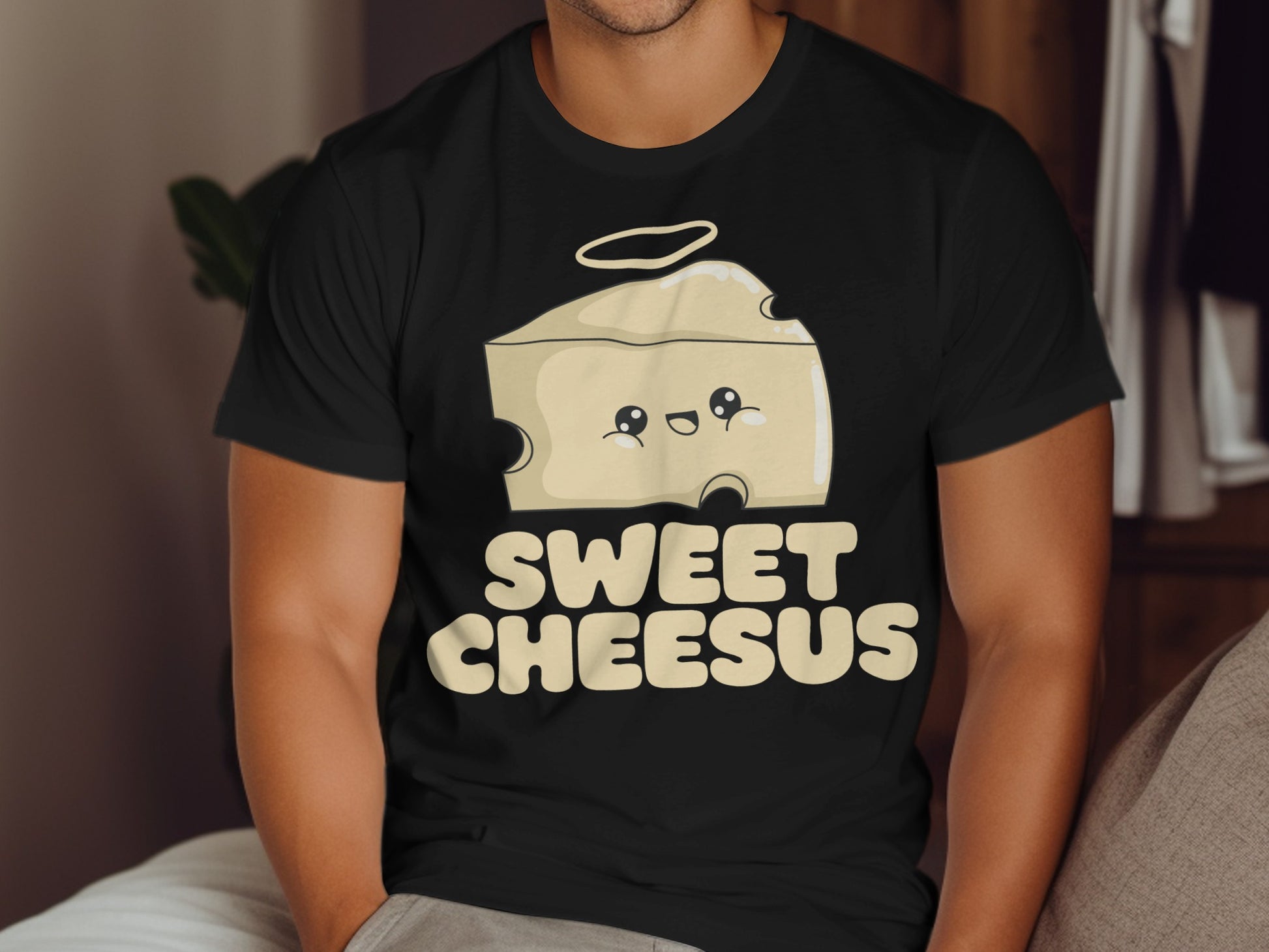 Black t-shirt with "Sweet Cheesus" text and cartoon cheese slice.
