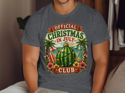 T-shirt with "Official Christmas in July Club" text, beach scene, and watermelon ornament.