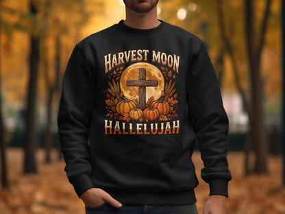 Black sweatshirt with "Harvest Moon Hallelujah" and a cross with pumpkins.