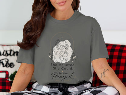T-shirt with line art of a praying woman, "She Believed She Could, So She Prayed".