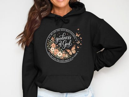 Black hoodie with floral graphic and "goodness of God" text.