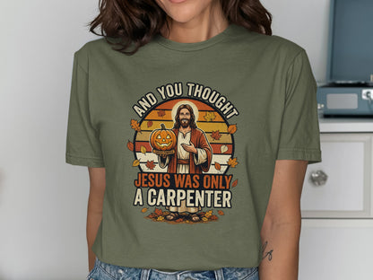 Jesus holding a pumpkin with "AND YOU THOUGHT JESUS WAS ONLY A CARPENTER" text.