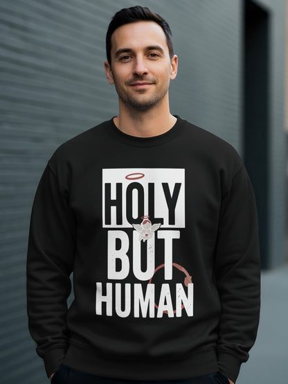 Black sweatshirt with "HOLY BUT HUMAN" text and angel graphic.
