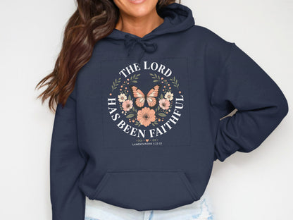 Navy hoodie with a circular graphic of butterflies and flowers, featuring text.