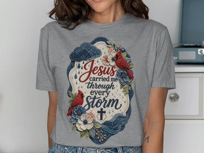 Jesus carried me through every storm text and floral cross design on gray t-shirt.