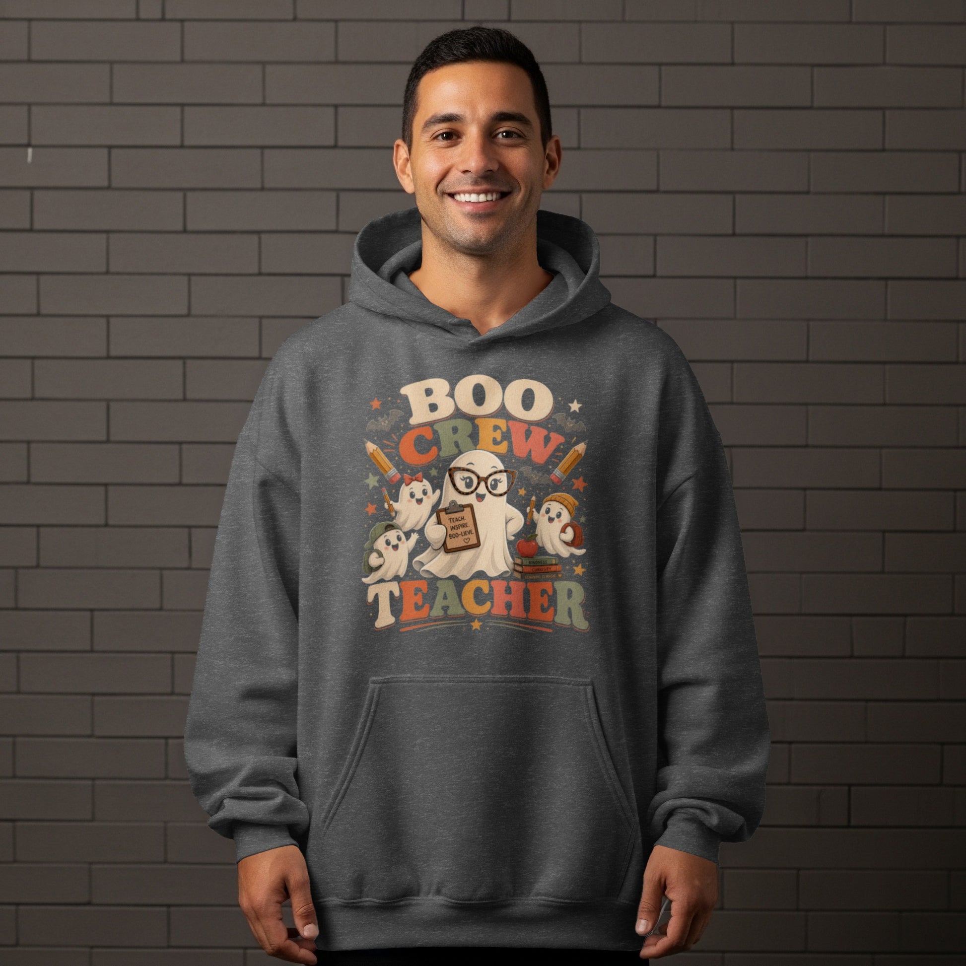 "Boo Crew Teacher" graphic with ghosts and school supplies on a gray hoodie.