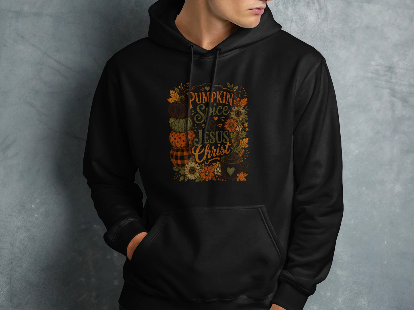 Black hoodie with "Pumpkin Spice Jesus Christ" text and fall graphic.
