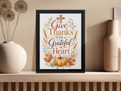 Framed artwork with text "Give Thanks With a Grateful Heart" and pumpkin.