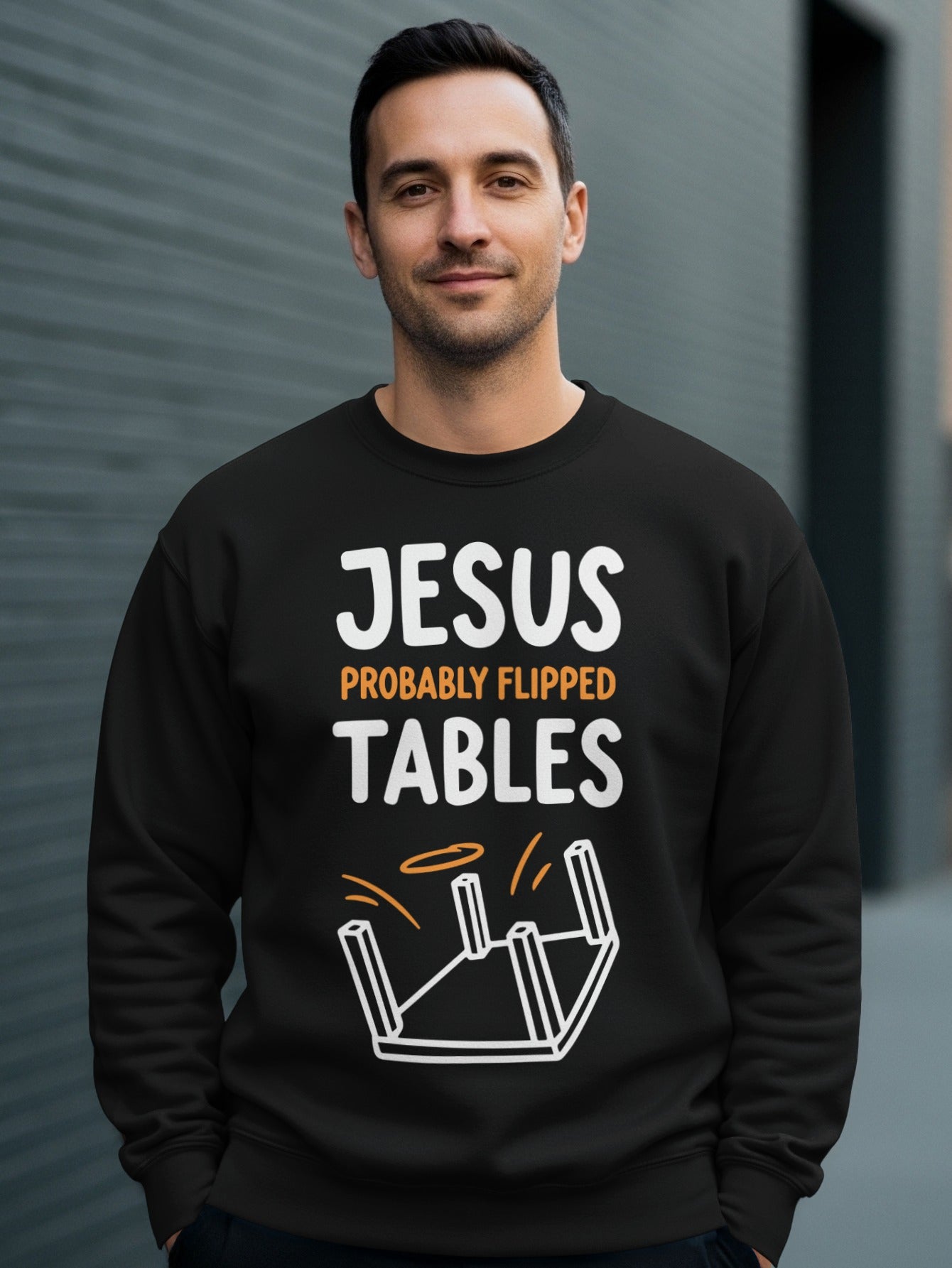 Black sweatshirt with "JESUS PROBABLY FLIPPED TABLES" text and graphic.