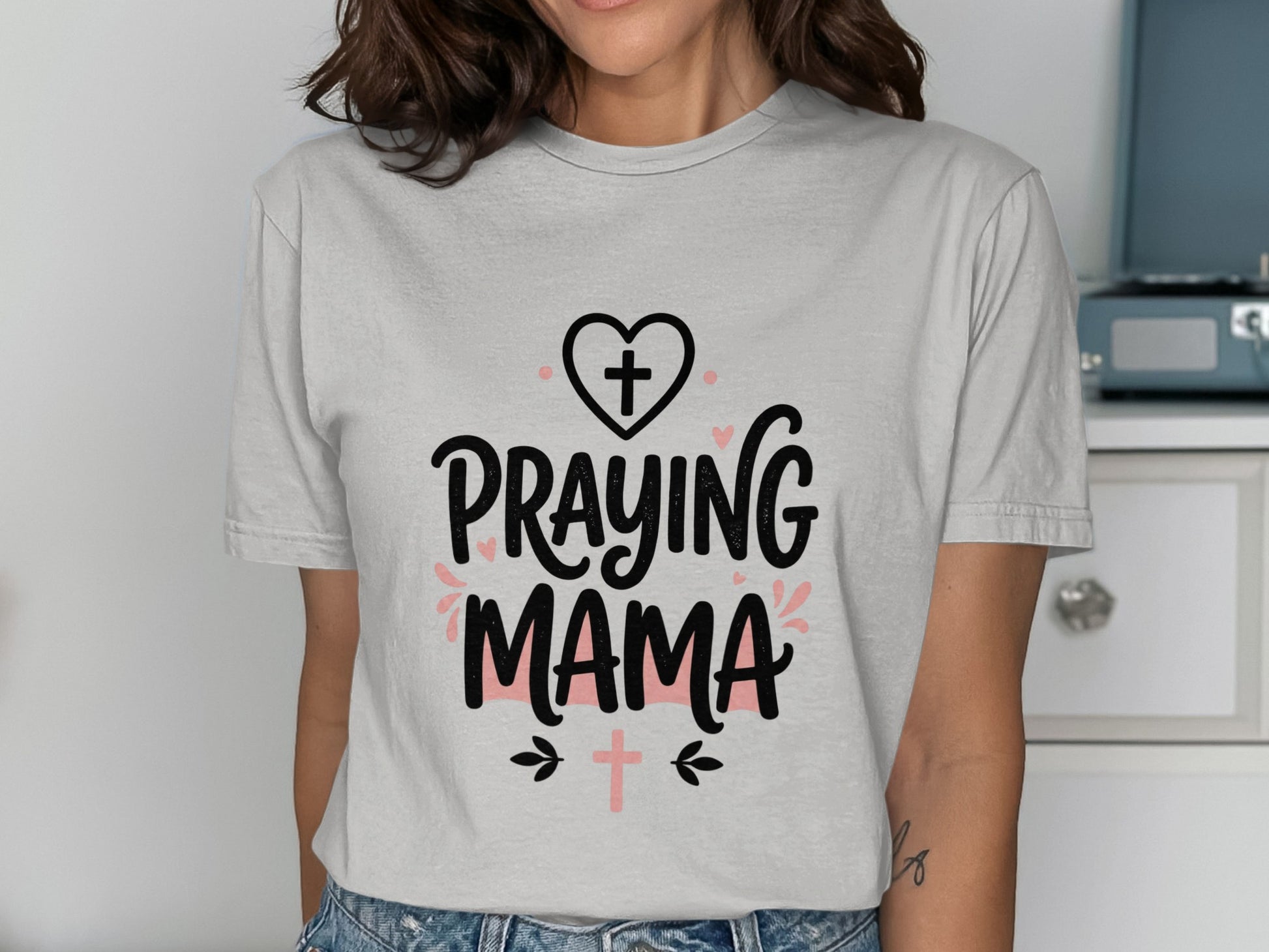 Praying Mama t-shirt with heart and crosses graphic.