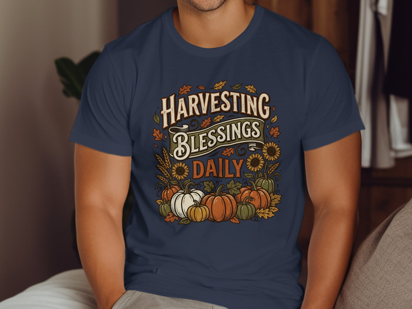 T-shirt with "Harvesting Blessings Daily" text, pumpkins, and sunflowers.