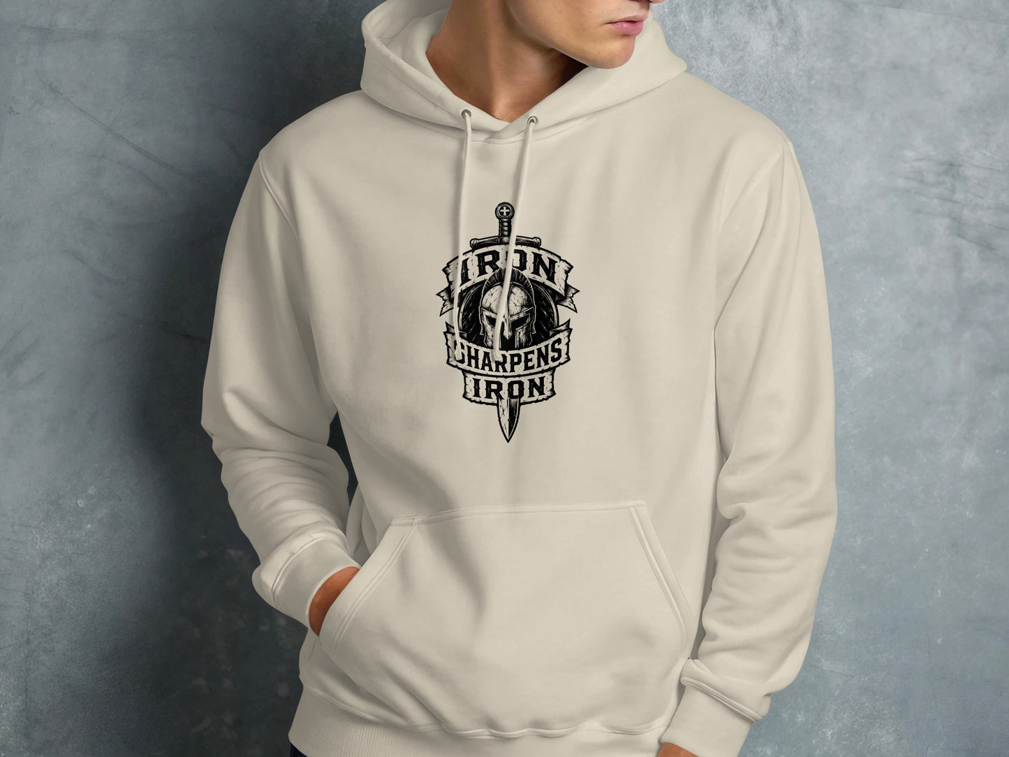 Cream hoodie with "Iron Sharpens Iron" shield and sword logo.