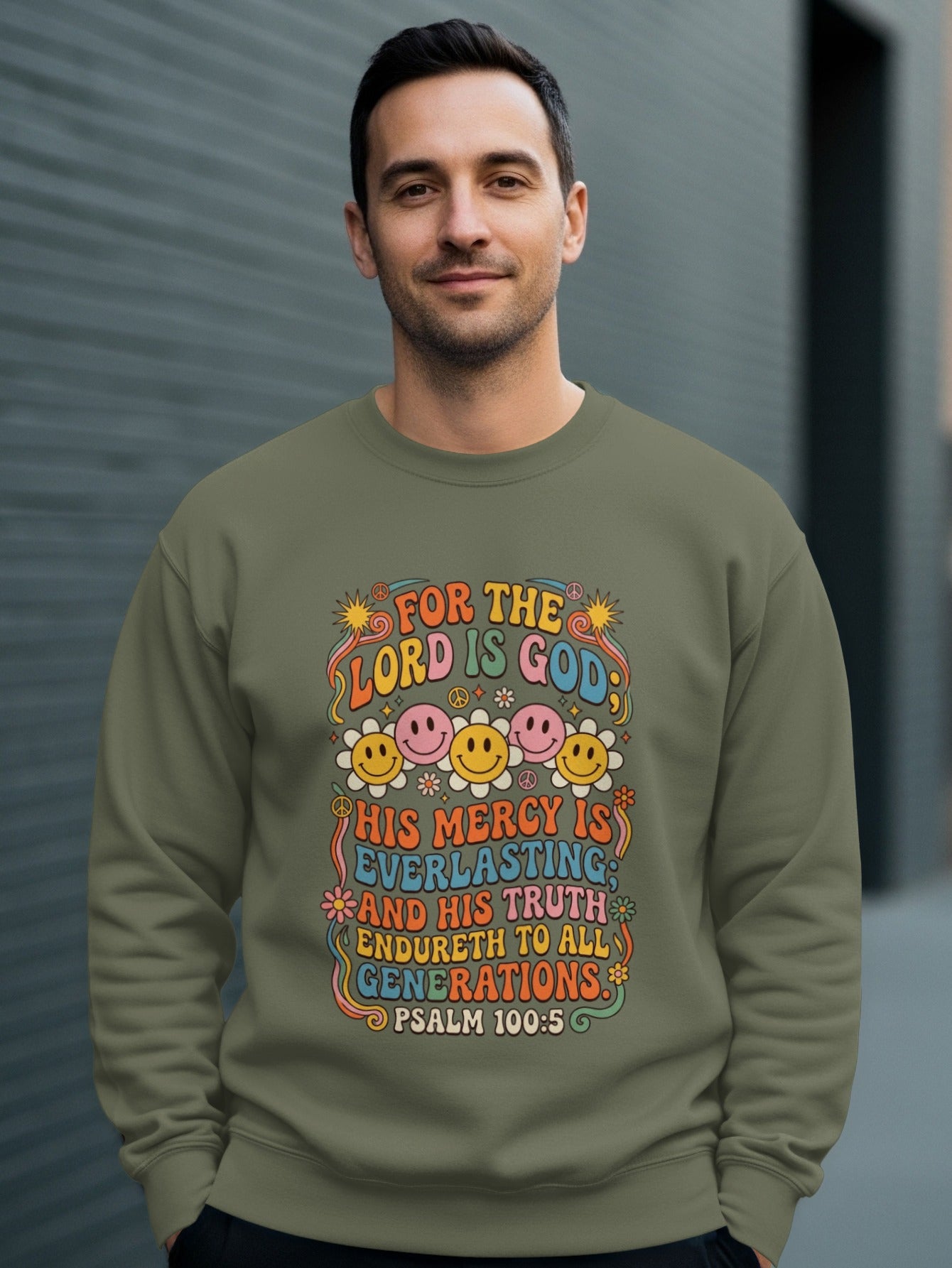 Green sweatshirt with "Lord is Gods mercy everlasting" text and smiley faces.