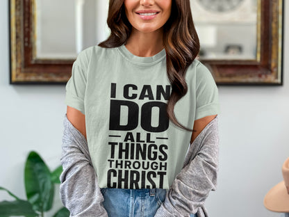 Light green t-shirt with black text that reads "I CAN DO ALL THINGS THROUGH CHRIST".