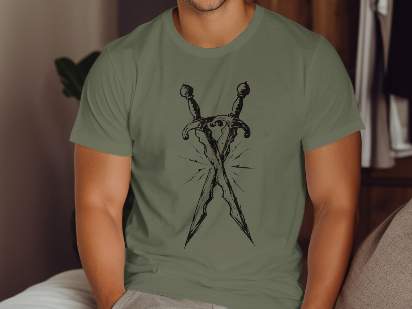 Crossed daggers illustration on a green t-shirt.