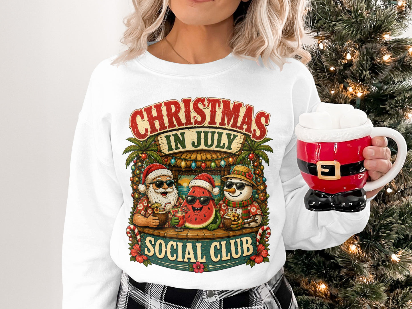 Christmas in July Social Club graphic on a white crewneck sweatshirt.
