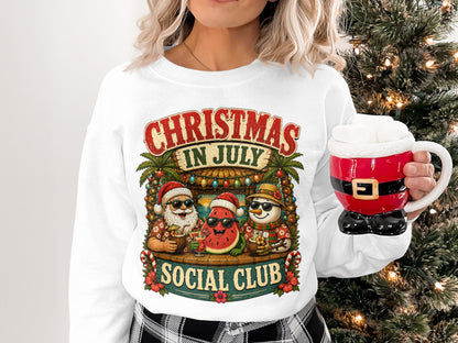 Christmas in July Social Club graphic on a white crewneck sweatshirt.