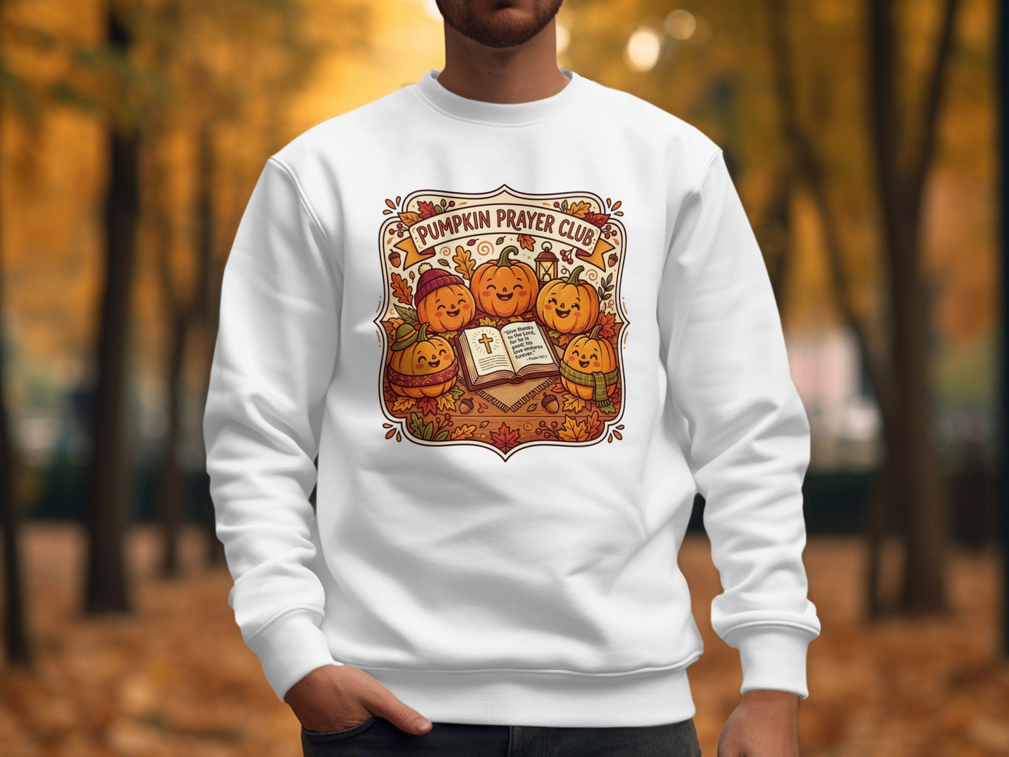 White sweatshirt with "Pumpkin Prayer Club" and a Bible verse.