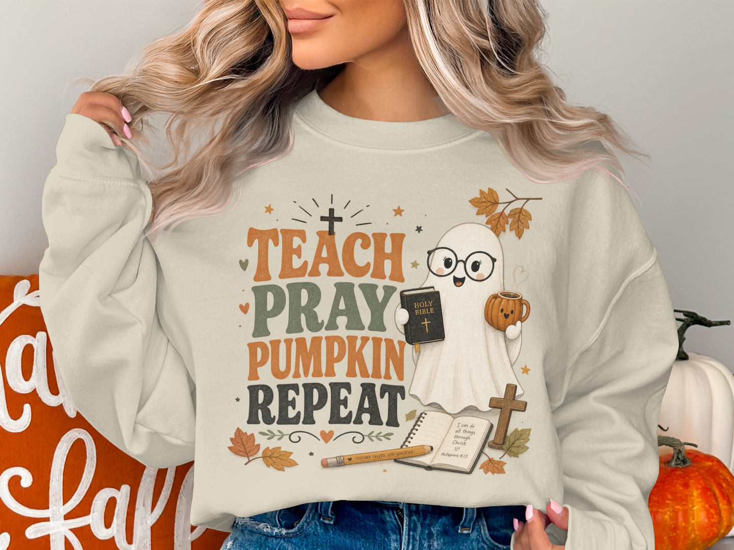 Crewneck sweatshirt with text "Teach Pray Pumpkin Repeat" and cute ghost.