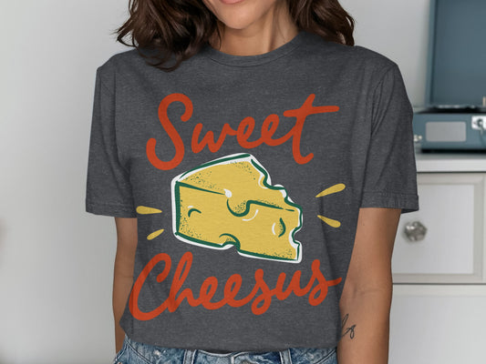 Dark grey t-shirt with "Sweet Cheesus" text and a cheese graphic.