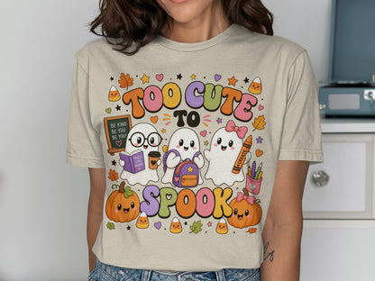 Three cute ghosts, pumpkins, and candy corn with text "TOO CUTE TO SPOOK".