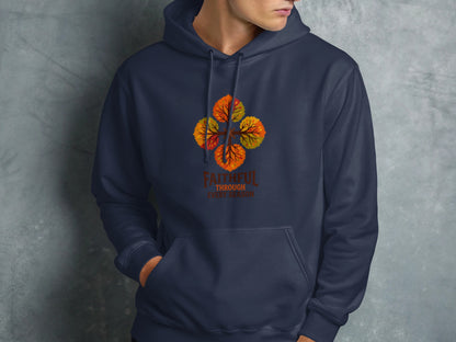 Navy blue hoodie with a circular design of colorful autumn leaves and text.