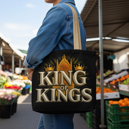 Tote bag with a throne, crowns, and text "KING OF KINGS" on a black background.