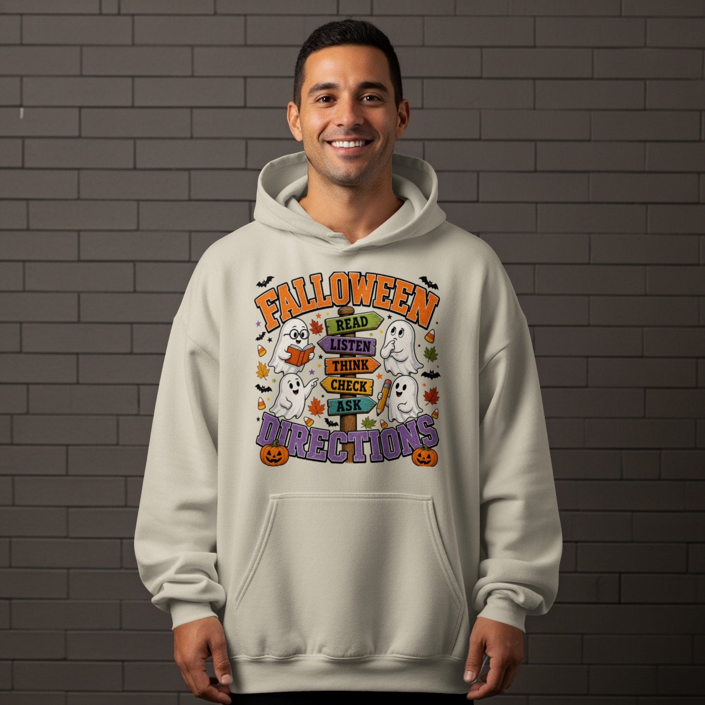 Hoodie graphic with "Falloween Directions" text and ghost characters.