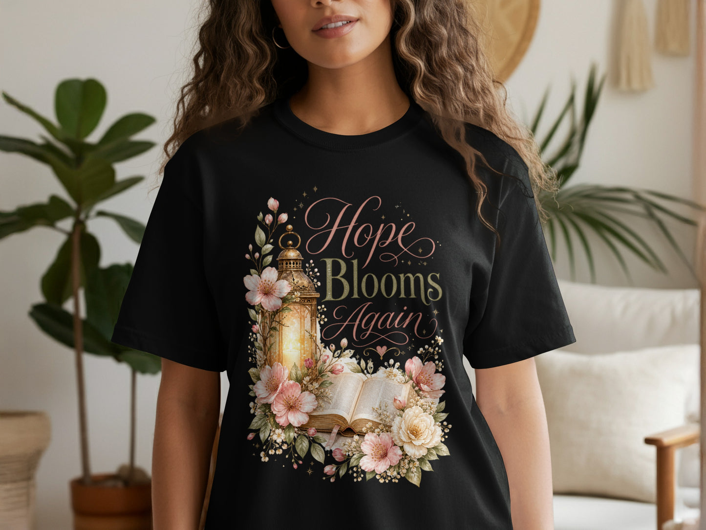 Black t-shirt with "Hope Blooms Again" text and floral design.