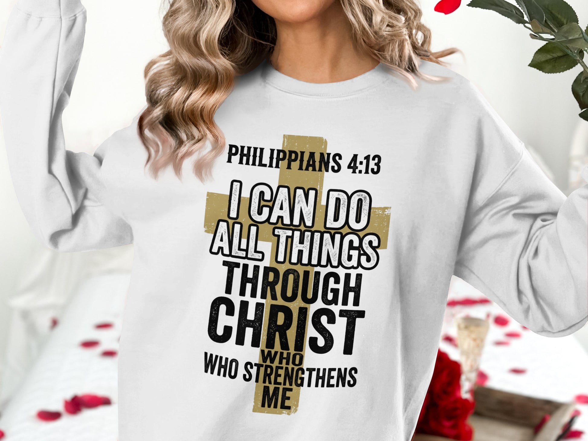 White sweatshirt with gold text, "Philippians 4:13 I can do all things through Christ who strengthens me."