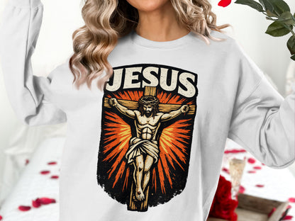 Jesus Christ crucified on the cross graphic on white crewneck sweatshirt.