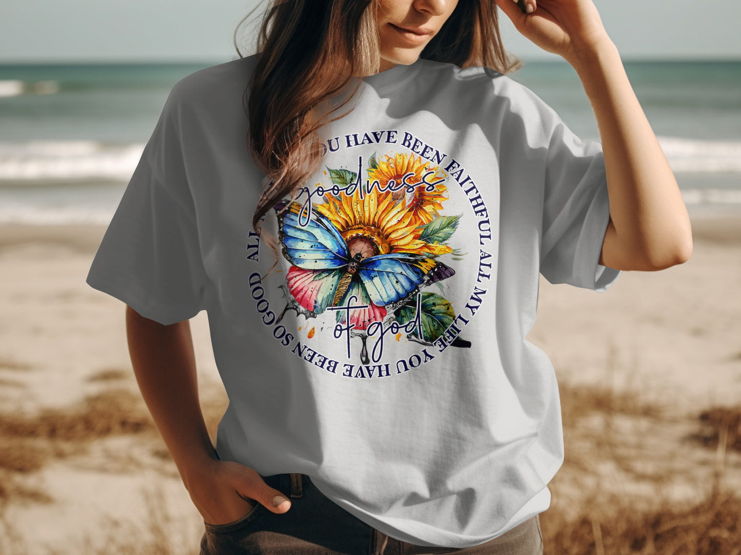 Light gray t-shirt with a circular floral and butterfly graphic and text.
