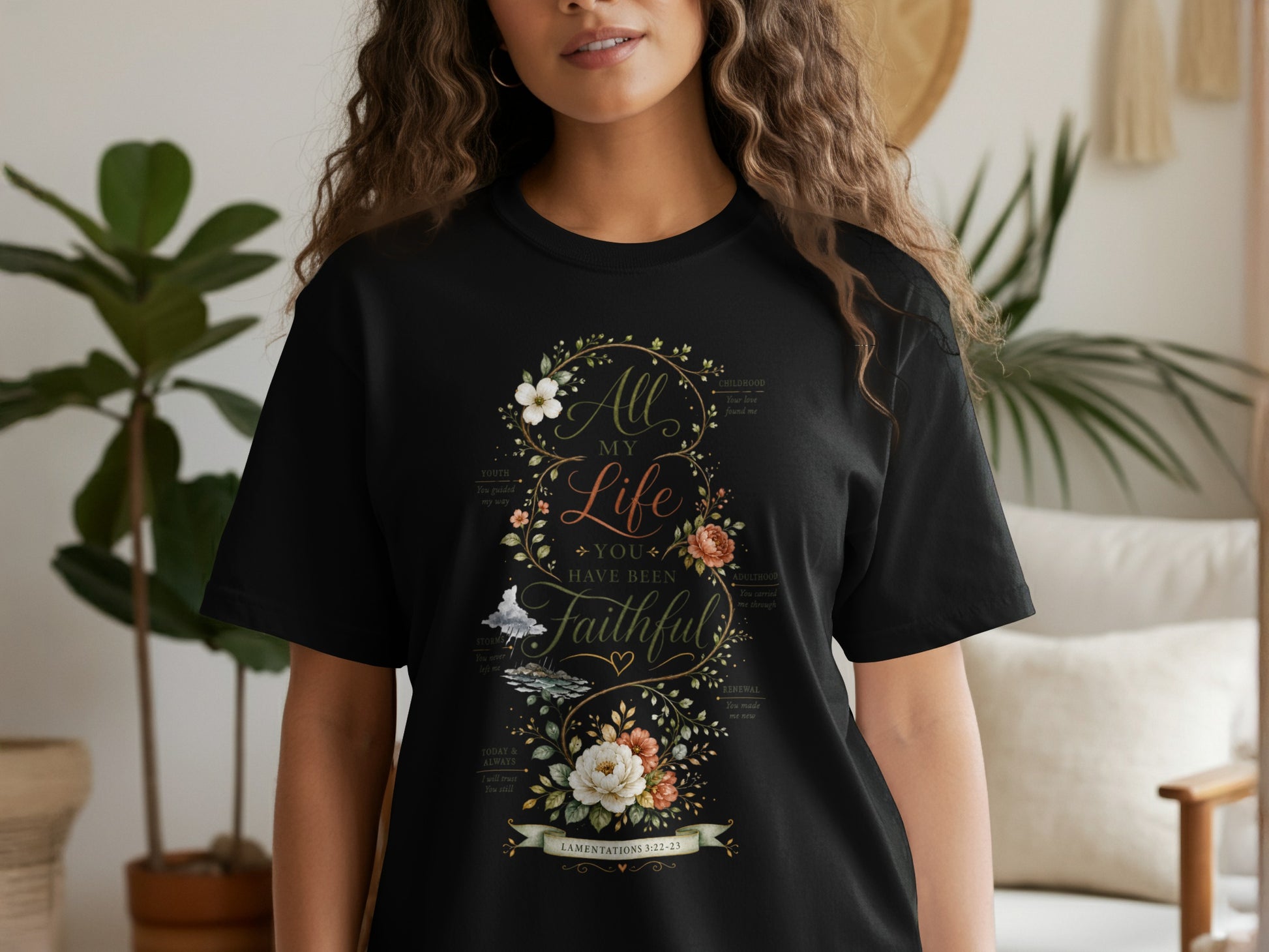Black t-shirt with floral design and text "All My Life You Have Been Faithful" Lamentations 3:22-23.