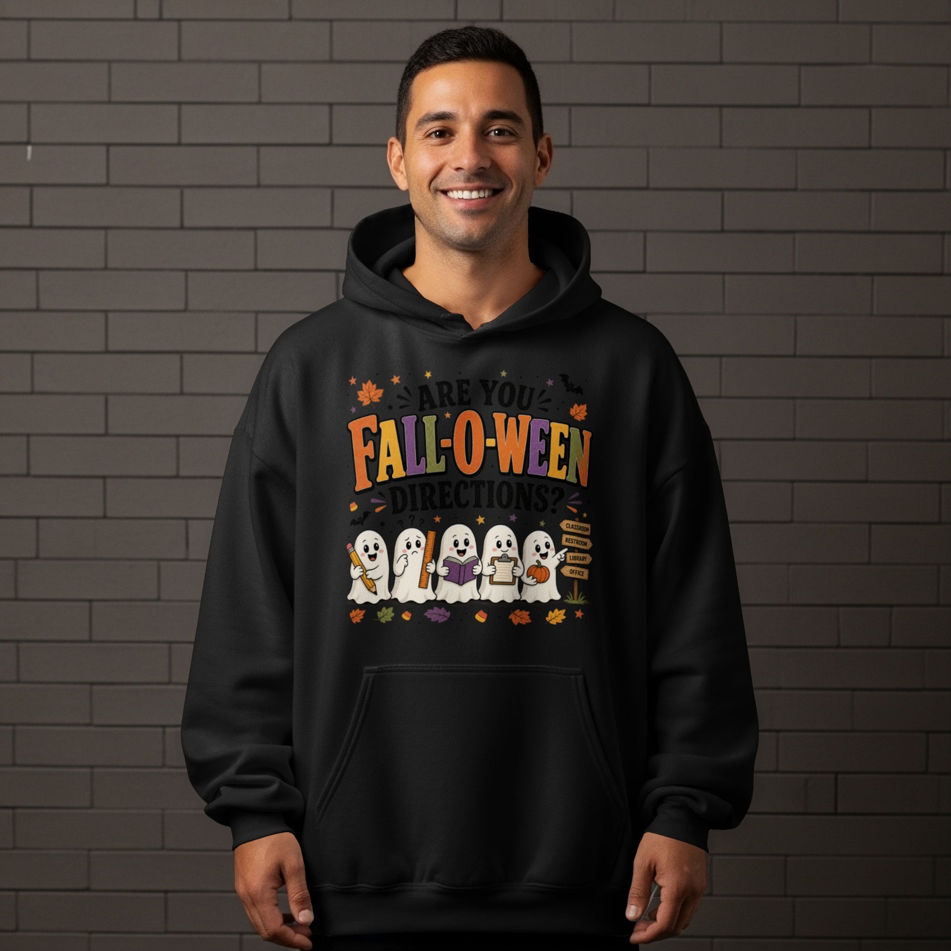 Black hoodie with ghosts holding school supplies and the text "Are You Fall-o-ween Directions?".